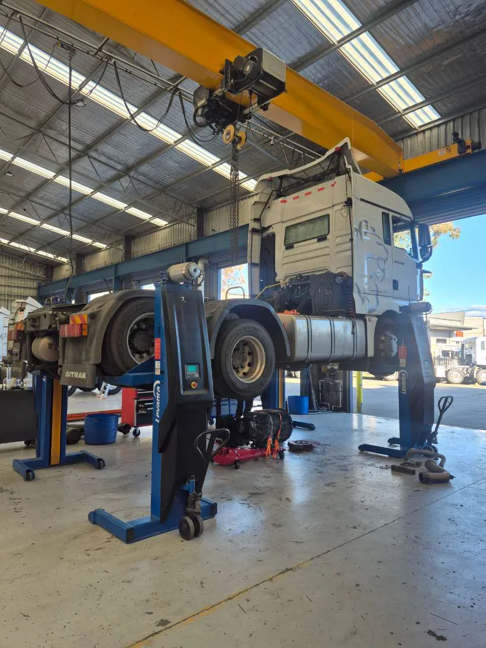 SITRAK prime mover raised in the RUMBLE Auto workshop